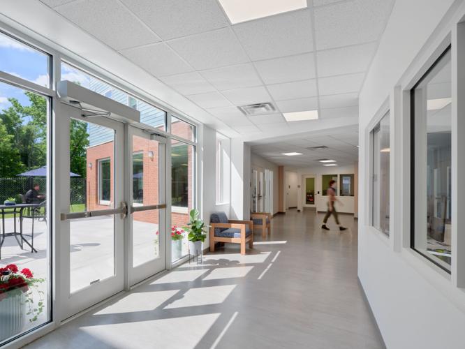 hallway with exterior doors to courtyard