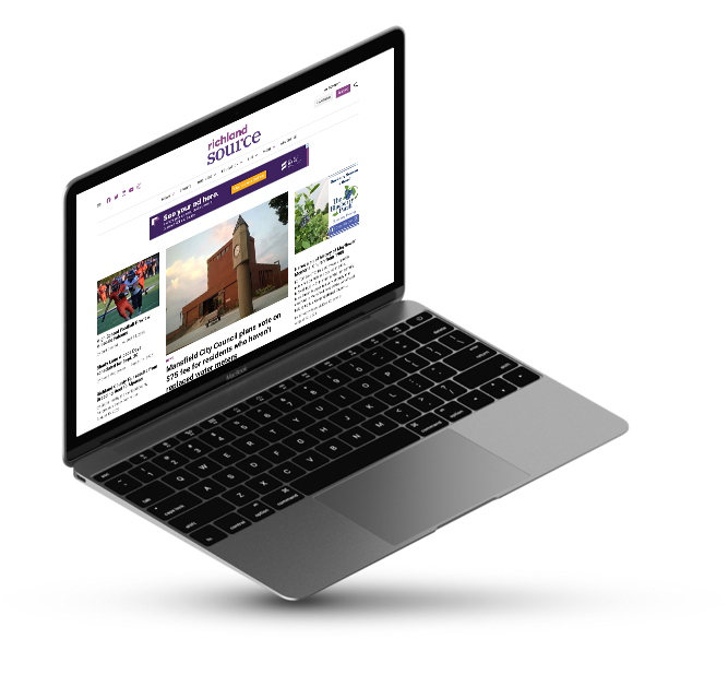 Laptop computer displaying the Richland Source homepage