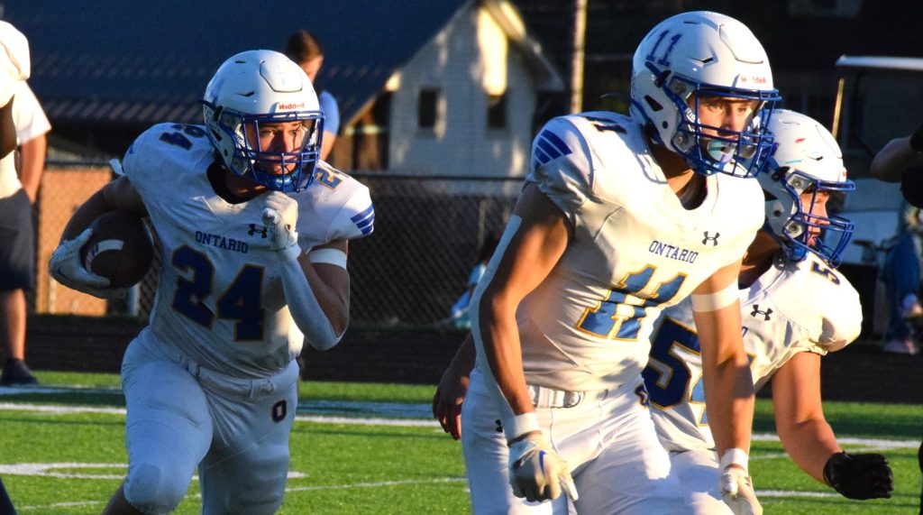 Chase Studer runs the ball for Ontario