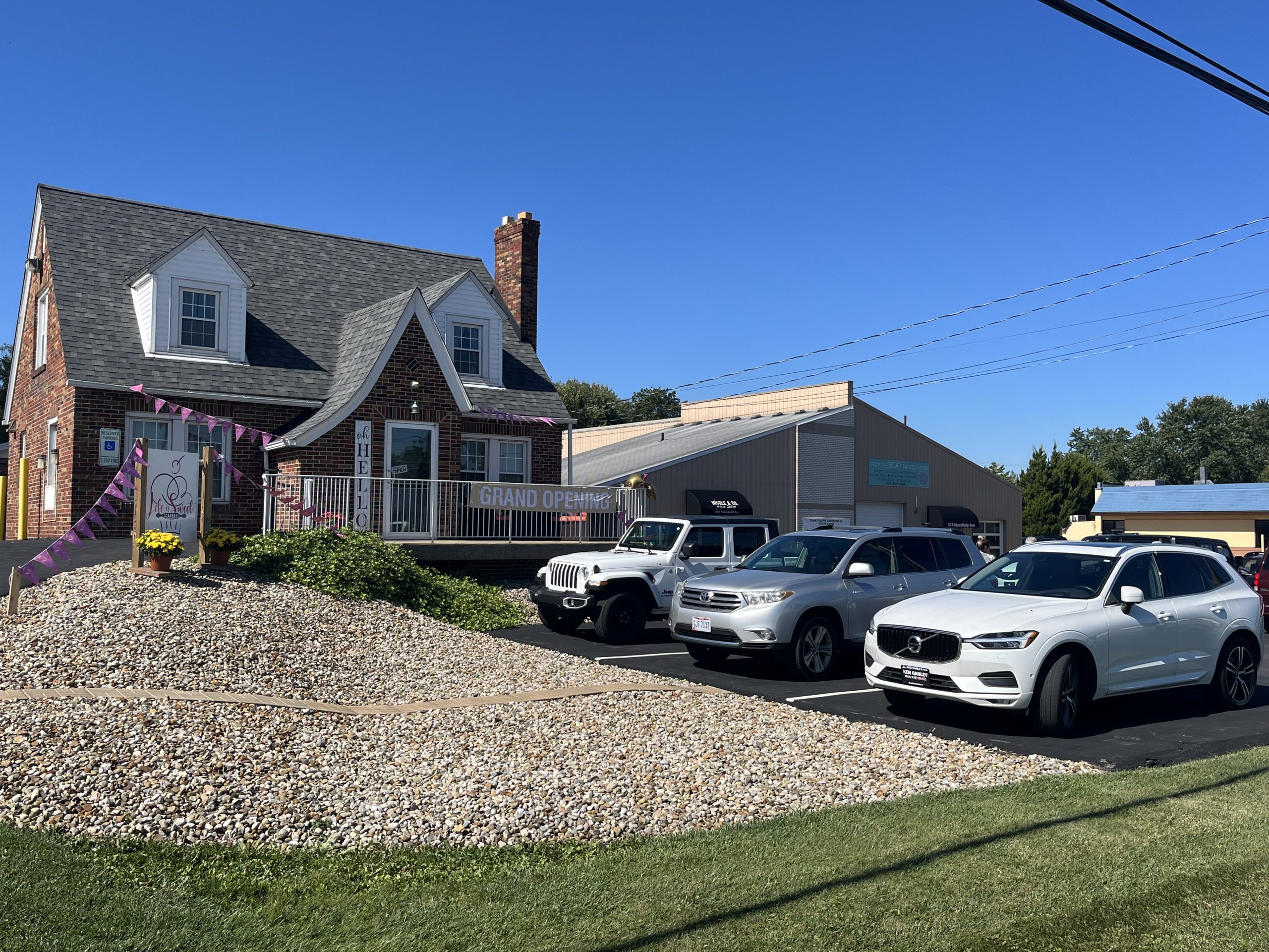 View of businesses from street.