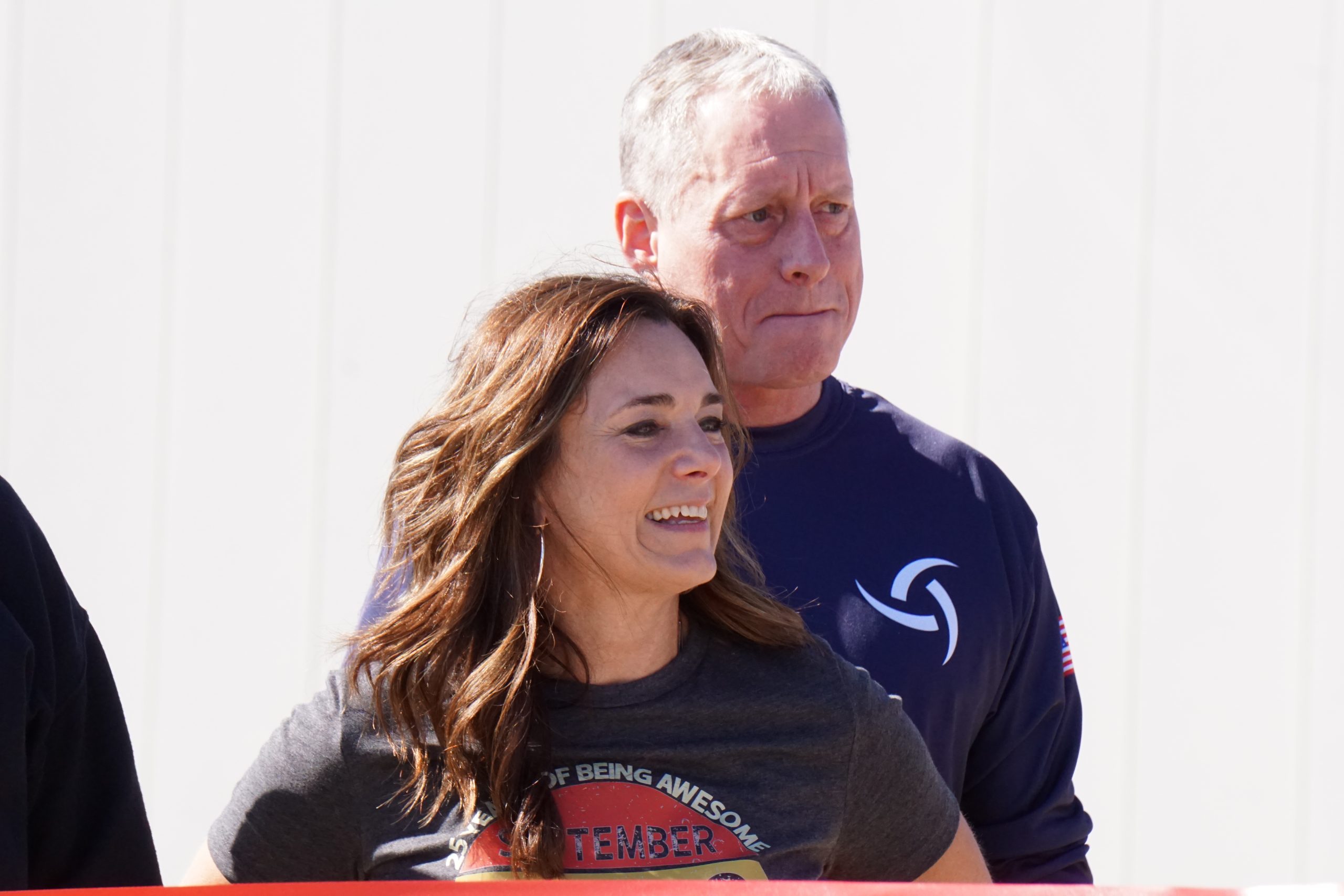 Man and woman standing next to each other.