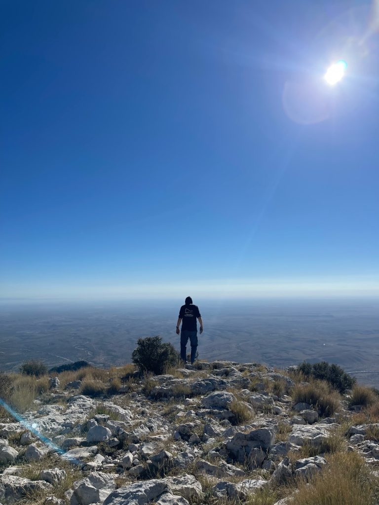 Adam Doc Fox on the summit of Guadalupe Peak