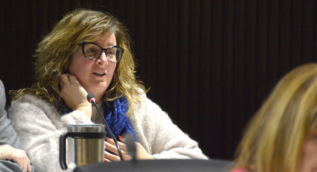 woman behind microphone