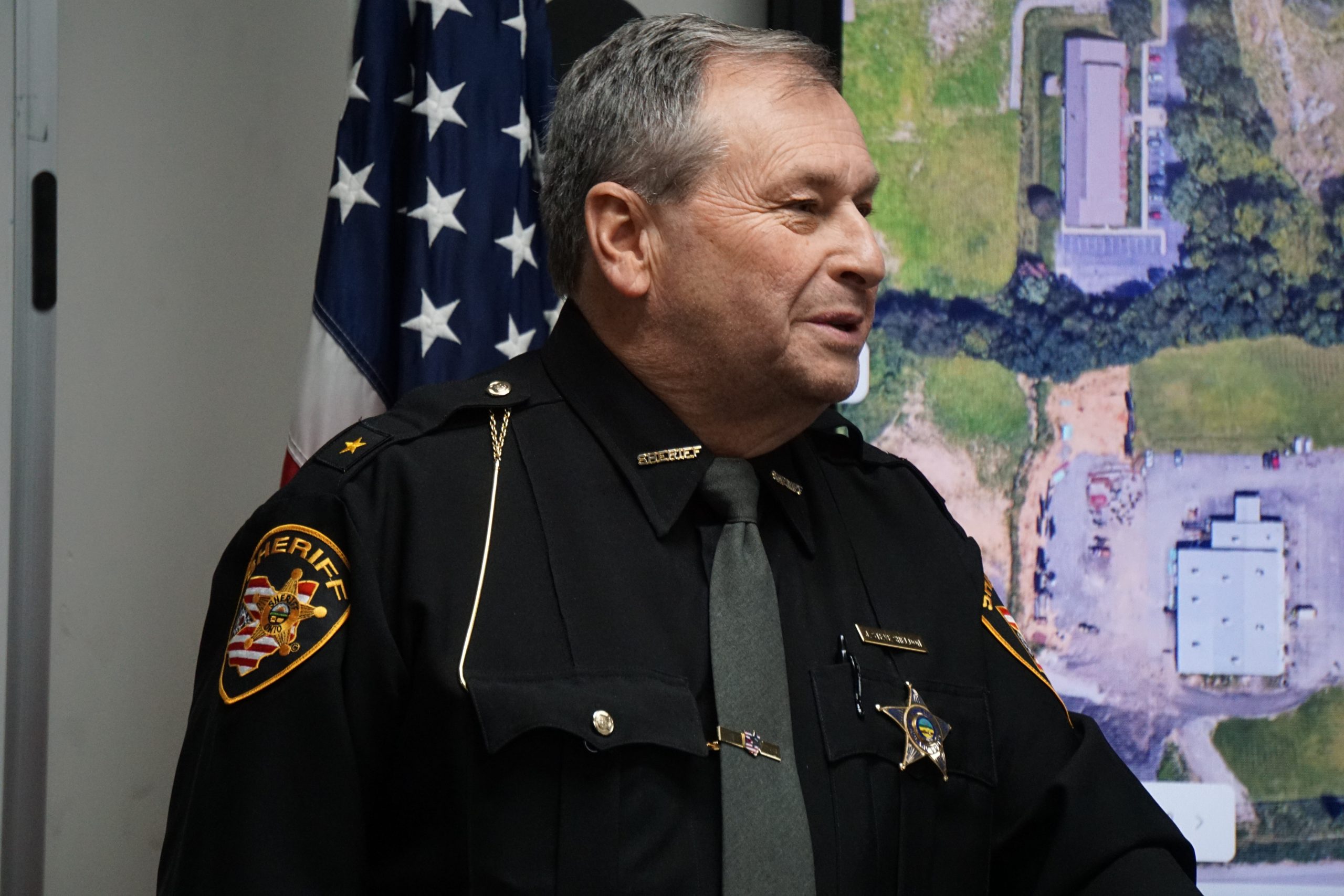 Sheriff speaking at podium