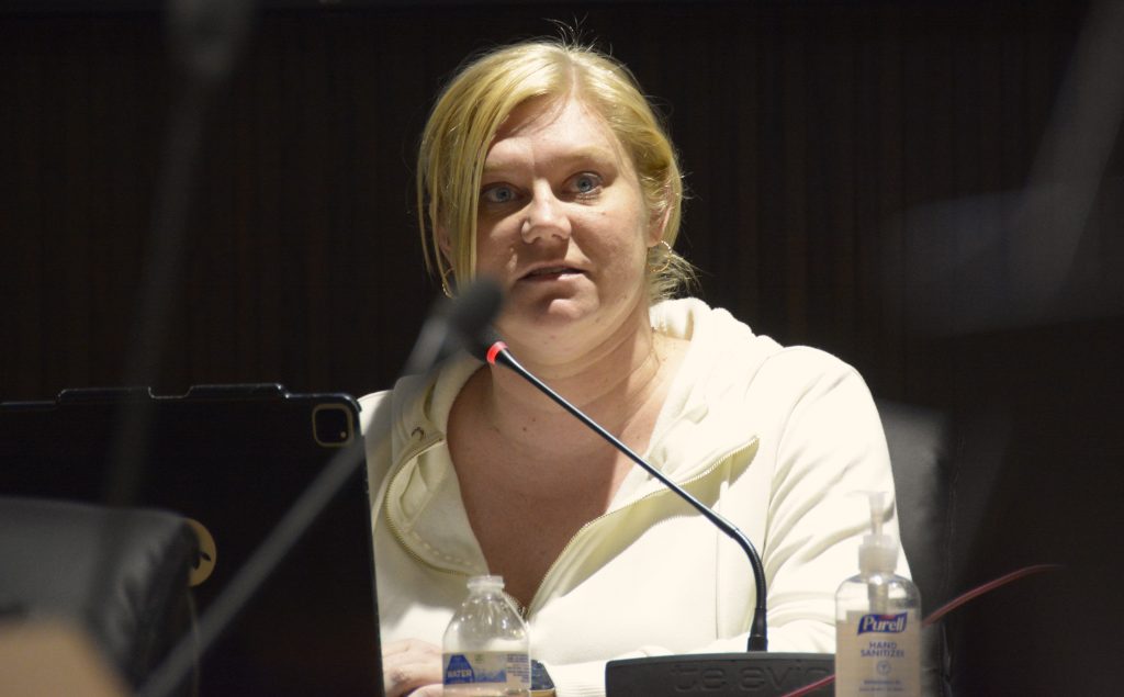 woman behind microphone