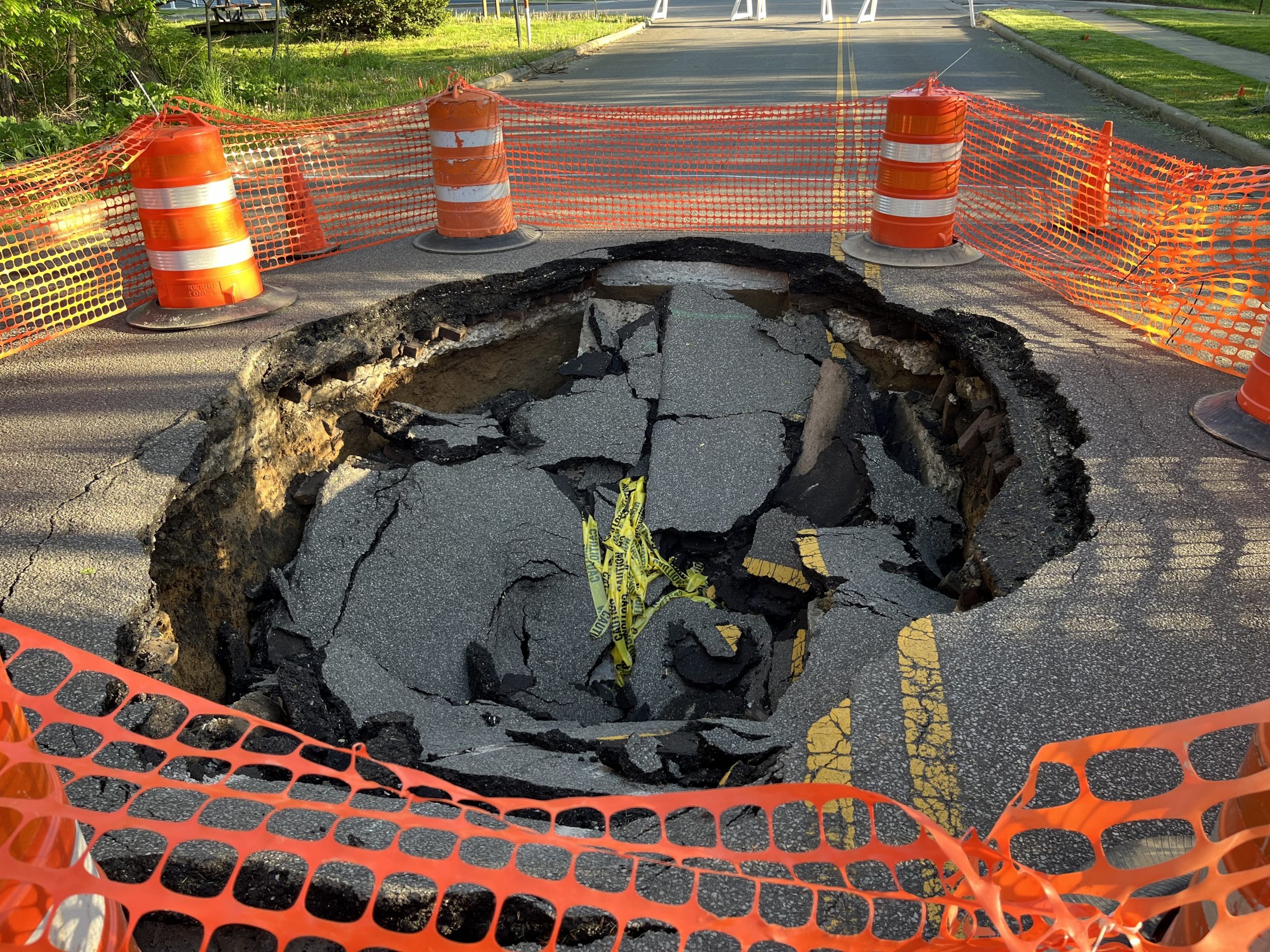 Pavement plunge: Sinkhole on Sturges Avenue opens over aging storm sewer - Vimarsana News